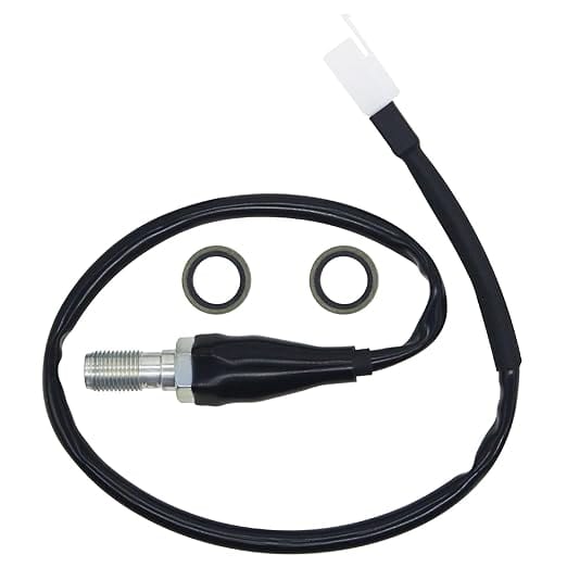 Mechanical component with black cable and metal fitting on a white background