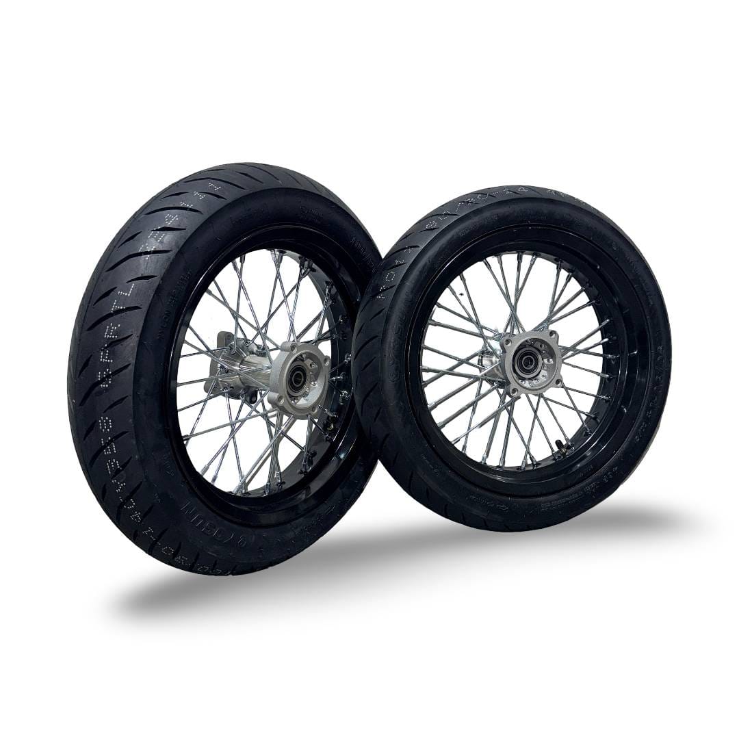 Two motorcycle wheels with black tires on a white background